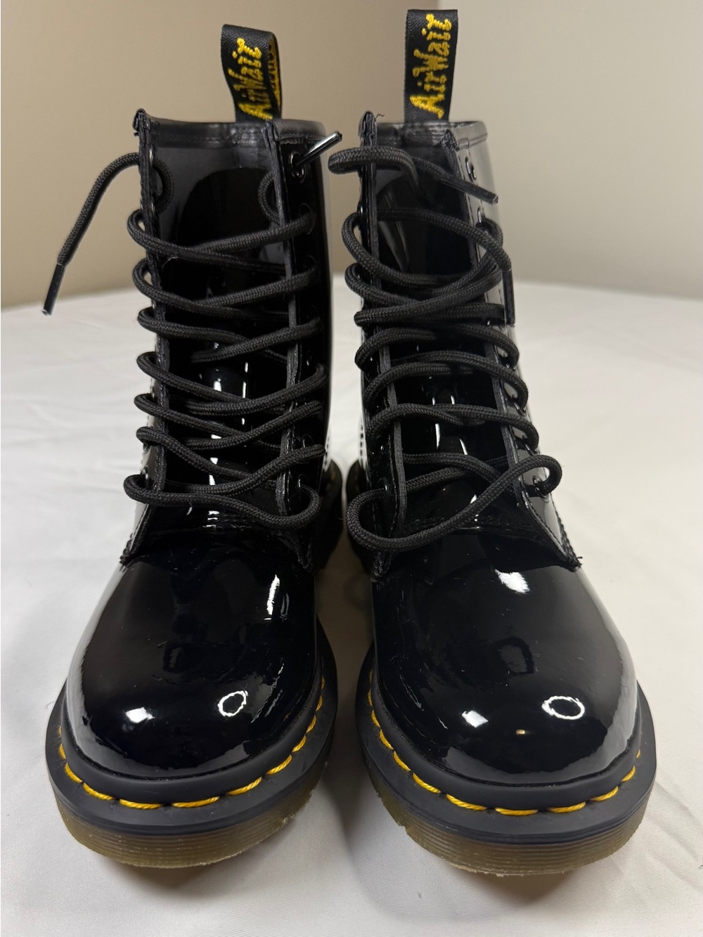 Dr. Martens Black Patent Lace-Up Boots with Yellow Stitching